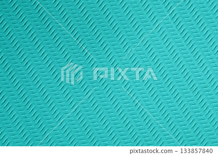 Blue background with diagonal wavy curve macro pattern with rough texture Blue background with diagonal wavy curve macro pattern with rough texture 133857840