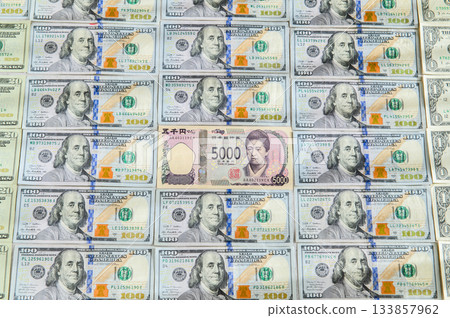 US $100 bill, Japanese Yen 5000 bill surrounded by men, female leader, close-up 2 US $100 bill, Japanese Yen 5000 bill surrounded by men, female leader, close-up 2 133857962