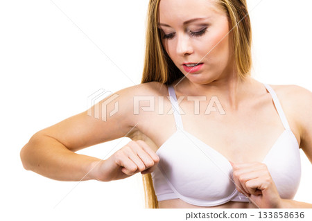 Female wearing too big bra Female wearing too big bra 133858636