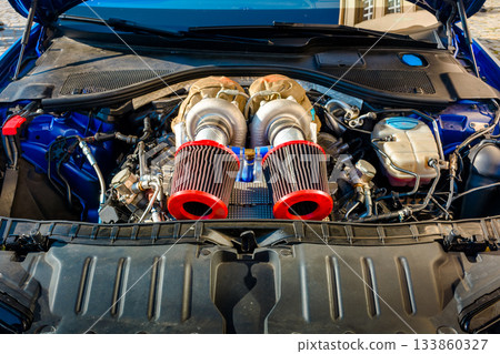 uzhhorod, ukraine - 31 nov 2021: audi gasoline car engine bay close up. perfect automotive air intake. powerful and high performance concept. background for maintenance and modification uzhhorod, ukraine - 31 nov 2021: audi gasoline car engine bay close up. perfect automotive air intake. powerful and high performance concept. background for maintenance and modification 133860327