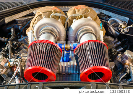 uzhhorod, ukraine - 31 nov 2021: audi gasoline car engine bay close up. perfect automotive air intake. powerful and high performance concept. background for maintenance and modification uzhhorod, ukraine - 31 nov 2021: audi gasoline car engine bay close up. perfect automotive air intake. powerful and high performance concept. background for maintenance and modification 133860328