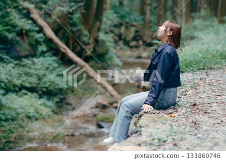 Woman taking a break in nature Woman taking a break in nature 133860746