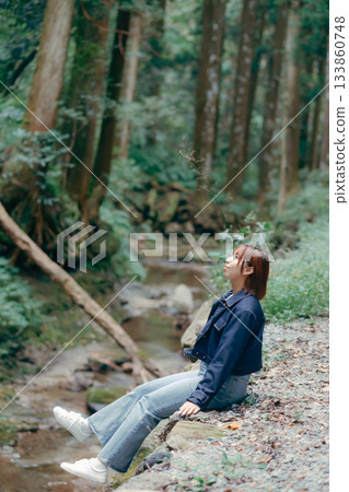 Woman taking a break in nature 133860748