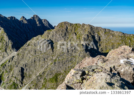 Mt. Karasawa seen from the summit (South Peak) of Mt. Kitahotaka. Climbing Mt. Kitahotaka in the Northern Alps Mt. Karasawa seen from the summit (South Peak) of Mt. Kitahotaka. Climbing Mt. Kitahotaka in the Northern Alps 133861397