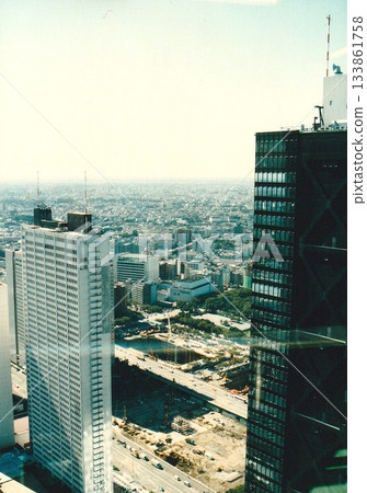The Tokyo Metropolitan Government building construction site from Shinjuku Subcenter during redevelopment in the 1980s The Tokyo Metropolitan Government building construction site from Shinjuku Subcenter during redevelopment in the 1980s 133861758