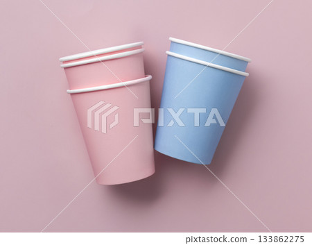 Disposable light blue and pink paper cups topview, mockup, copy space. Single-use take off containers 133862275