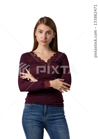 Slavic woman in burgundy lace top and jeans 133862471