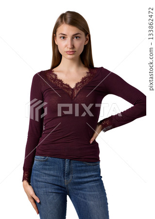 Slavic woman in burgundy lace top and jeans Slavic woman in burgundy lace top and jeans 133862472