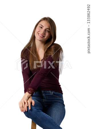Slavic woman smiling gently in studio portrait 133862492