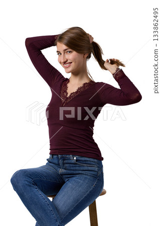 Slavic woman smiling gently in studio portrait 133862495