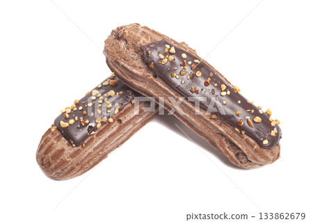 Delicious eclairs with chocolate isolated on white Delicious eclairs with chocolate isolated on white 133862679