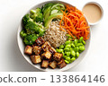 Vegan tofu bowl with broccoli, carrots, edamame, and rice is served. 133864146