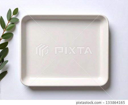 Light natural colors. Ceramic tray isolated on white background. Serving plate. Classic beige design. Top view. Light natural colors. Ceramic tray isolated on white background. Serving plate. Classic beige design. Top view. 133864165