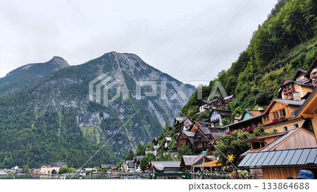 Hallstatt, Austria - July 27 2023: Beautiful Hallstatt Lake Hallstatt, Austria - July 27 2023: Beautiful Hallstatt Lake 133864688