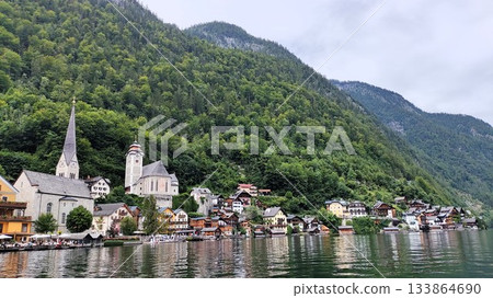 Hallstatt, Austria - July 27 2023: Beautiful Hallstatt Lake Hallstatt, Austria - July 27 2023: Beautiful Hallstatt Lake 133864690