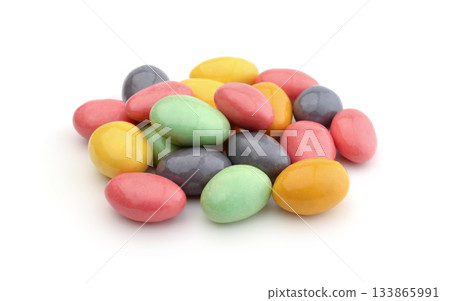 Almonds covered with colorful glaze isolated. Almonds covered with colorful glaze isolated. 133865991