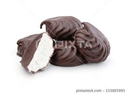 Marshmallows covered in chocolate isolated on white. 133865993