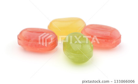 Fruit candies isolated on white. 133866006