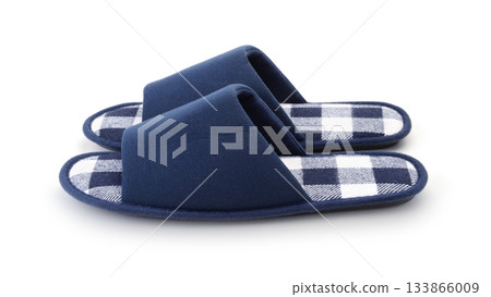 Textile slippers isolated on white. 133866009