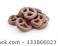 Chocolate covered pretzels isolated on white. 133866023