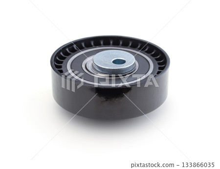 Timing belt tension roller isolated on white. 133866035