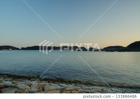 Calm sea at sunset 133866486