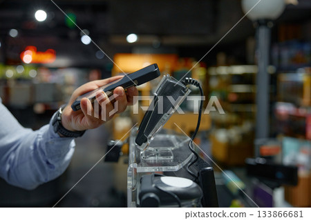 A person is using a cell phone to successfully scan a barcode 133866681