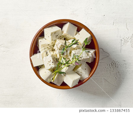 bowl of fresh greek cheese cubes 133867455