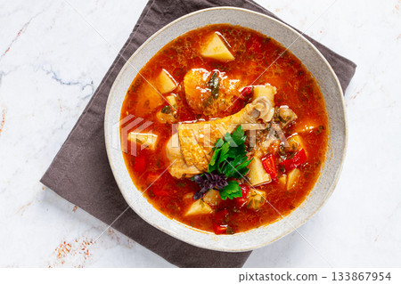 Souzi soup. Georgian dish, meat with oats, tomato sauce and herbs, Souzi soup. Georgian dish, meat with oats, tomato sauce and herbs, 133867954