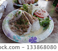 Hawaiian plate of chicken and salad with gravy 133868080