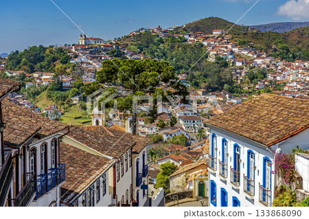 Houses, churches and mountains 133868090