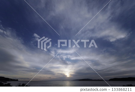 Evening sky with various clouds spread across the sky, winter, ultra-wide angle, sky-focused, 240202pm 133868211