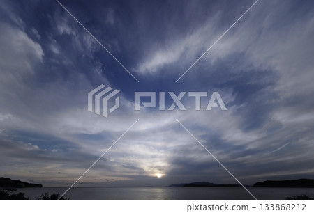 Evening sky with various clouds spread across the sky, winter, ultra-wide angle, sky-focused, 240202pm 133868212