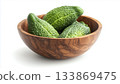 Fresh Bitter Gourd In Wooden Bowl On White Background 133869475