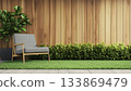 Modern Gray Chair And Empty Wood Plank Wall Adorn This Wooden Terrace With Green Lawn Rendering 133869479