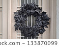 Halloween wreath decoration on an entrance door 133870099