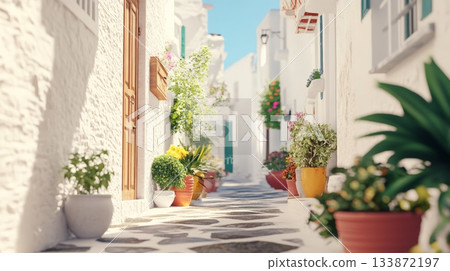 Sunlight bathes a quaint alley, illuminating whitewashed houses adorned with vibrant flower pots, creating a serene and inviting atmosphere in a traditional mediterranean village 133872197