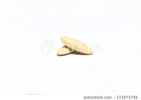 Pumpkin seeds on a white background, isolated. Top view, pumpkin seeds background Pumpkin seeds on a white background, isolated. Top view, pumpkin seeds background 133873756