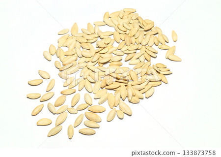 Pumpkin seeds on a white background, isolated. Top view, pumpkin seeds background Pumpkin seeds on a white background, isolated. Top view, pumpkin seeds background 133873758