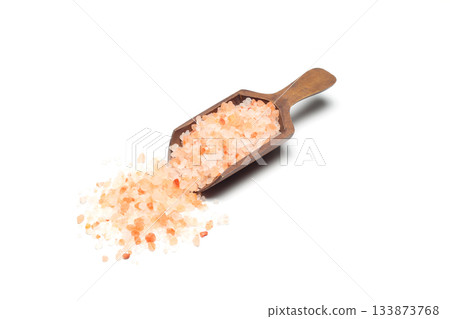 Himalayan salt on an isolated white background. Himalayan salt in a scoop 133873768
