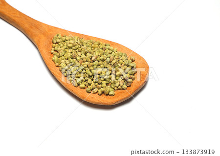 Heap of Dry thyme in wooden spoon isolated on white background. Dried spice concept. Selective Focus Heap of Dry thyme in wooden spoon isolated on white background. Dried spice concept. Selective Focus 133873919