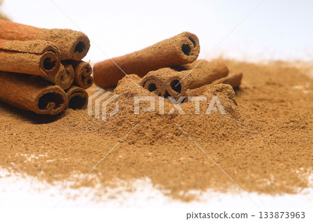 Cinnamon sticks and cinnamon powder isolated on white background, healthy spice, (Cinnamomum) 133873963