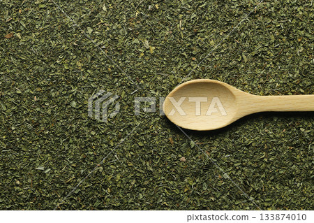 Dry mint in wooden spoon isolated on white background 133874010