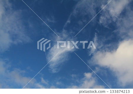 The vast blue sky and clouds sky. blue sky background with tiny clouds. blue sky panorama The vast blue sky and clouds sky. blue sky background with tiny clouds. blue sky panorama 133874213