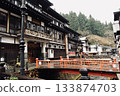 Bridge over the river in the hot spring town 133874703