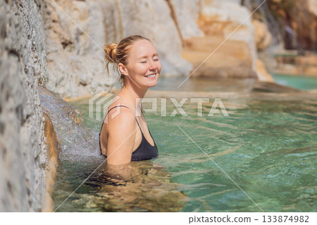 Female tourist exploring Grutas Tolantongo in Mexico, enjoying natural hot springs, scenic caves, and outdoor adventure. Travel, wellness, and sightseeing concept Female tourist exploring Grutas Tolantongo in Mexico, enjoying natural hot springs, scenic caves, and outdoor adventure. Travel, wellness, and sightseeing concept 133874982