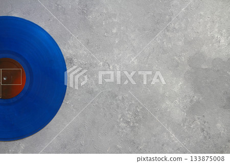 Aged black paper cover and vinyl LP record isolated on black background Aged black paper cover and vinyl LP record isolated on black background 133875008
