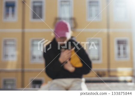 Softfocused cityscape featuring cheerful puppy and pastel buildings Softfocused cityscape featuring cheerful puppy and pastel buildings 133875844