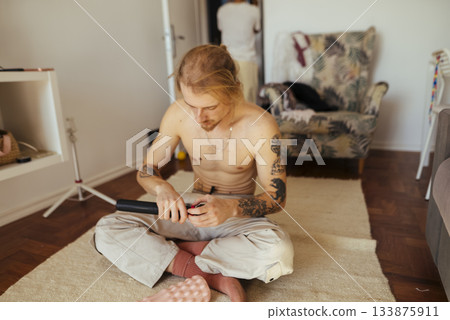 Calm and intimate morning ritual of pouring tea in cozy home setting Calm and intimate morning ritual of pouring tea in cozy home setting 133875911