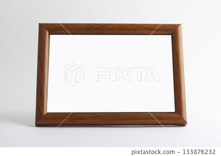 Empty wooden frame for painting, picture or text on white wood background. Wooden blank picture frame Empty wooden frame for painting, picture or text on white wood background. Wooden blank picture frame 133876232